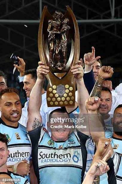 Paul Gallen of the Sharks holds aloft the Premiership Trophy after winning the 2016 NRL Grand Final match between the Cronulla Sharks and the...
