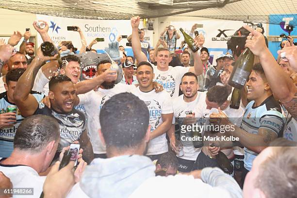 The Sharks celebrate victory in the dressing room after winning the 2016 NRL Grand Final match between the Cronulla Sharks and the Melbourne Storm at...