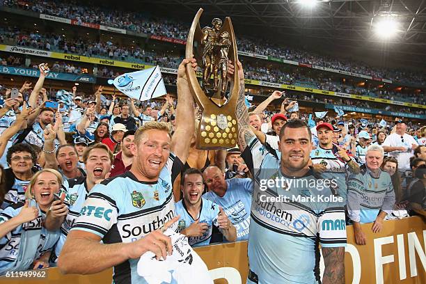 Matt Prior and Andrew Fifita of the Sharks celebrate with the trophy after victory in the 2016 NRL Grand Final match between the Cronulla Sharks and...