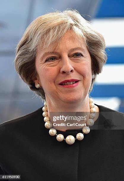 British Prime Minister Theresa May arrives ahead of delivering a speech to delegates and party members about Brexit on the first day of the...