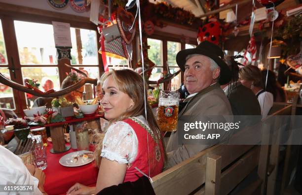 Bayern Munich's Italian head coach Carlo Ancelotti and his wife Mariann Barrena McClay during the traditional visit of FC Bayern Munich at the...