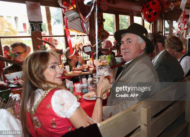 Bayern Munich's Italian head coach Carlo Ancelotti and his wife Mariann Barrena McClay during the traditional visit of FC Bayern Munich at the...