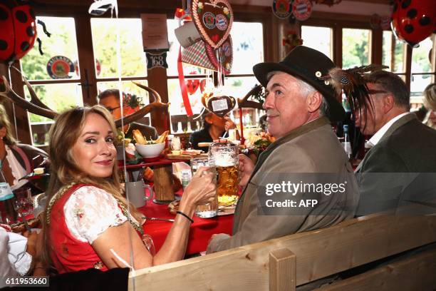 Bayern Munich's Italian head coach Carlo Ancelotti and his wife Mariann Barrena McClay pose during the traditional visit of FC Bayern Munich at the...