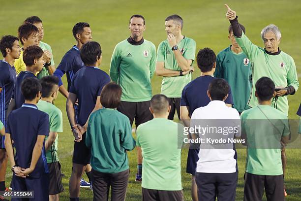 Japan head coach Vahid Halilhodzic gives instructions to his players on the first day of a training camp in Saitama, north of Tokyo, on Oct. 2 to...
