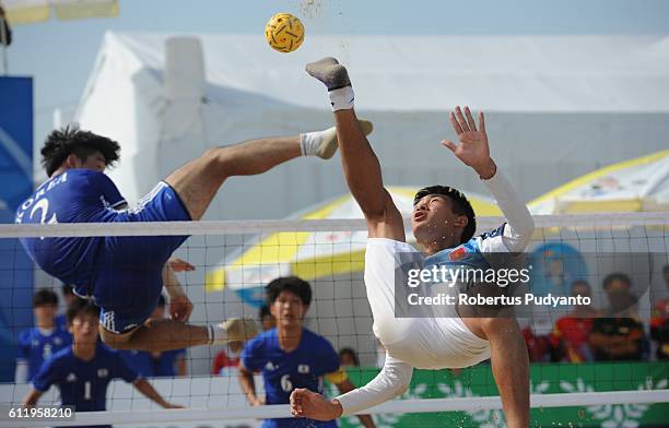 Vietnam player plays a shoot during Beach Sepak Takraw Men's team competition against Korea on day nine of the 5th Asian Beach Games 2016 at My Khe...