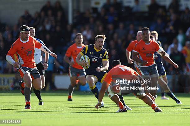 Tom Heahtcote of Worcester runs at Sinoti Sinoti of Newcastle during the Aviva Premiership match between Worcester Warriors and Newcastle Falcons at...