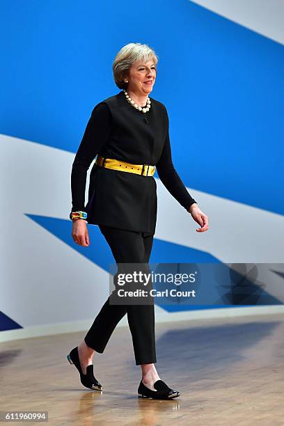 British Prime Minister Theresa May arrives to deliver a speech about Brexit on the first day of the Conservative Party Conference 2016 at the ICC...