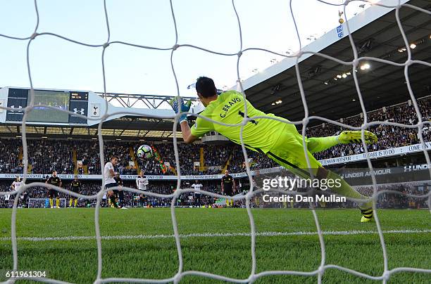 Claudio Bravo of Manchester City saves Erik Lamela of Tottenham Hotspur penalty during the Premier League match between Tottenham Hotspur and...