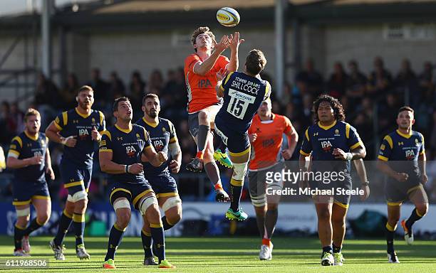Simon Hammersley of Newcastle challenges for a high ball with Jamie Shillcock of Worcester during the Aviva Premiership match between Worcester...