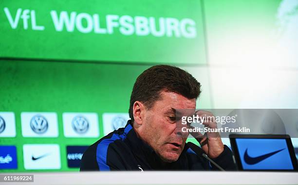 Dieter Hecking, head coach of Wolfsburg ponders during the press conference after the Bundesliga match between VfL Wolfsburg and 1. FSV Mainz 05 at...