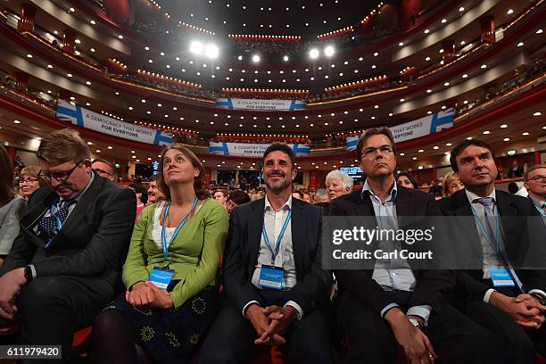 Delegates look on during a speech on the first day of the Conservative Party Conference 2016 at the ICC Birmingham on October 2, 2016 in Birmingham,...