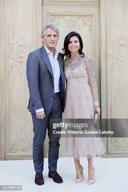 Roberto Mancini and Silvia Fortini attend the Valentino show as part of the Paris Fashion Week Womenswear Spring/Summer 2017 on October 2, 2016 in...