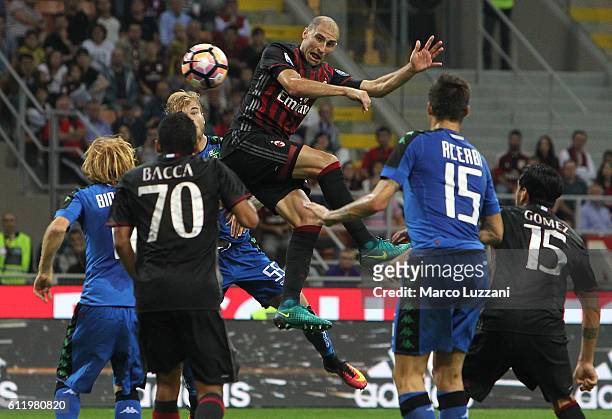 Gabriel Paletta of AC Milan scores his goal during the Serie A match between AC Milan and US Sassuolo at Stadio Giuseppe Meazza on October 2, 2016 in...