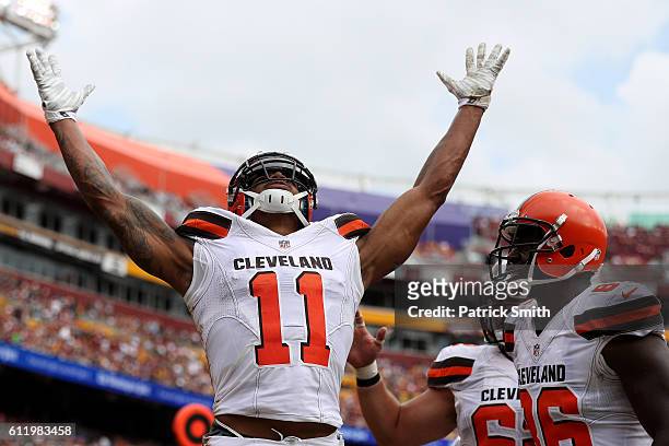 Wide receiver Terrelle Pryor of the Cleveland Browns celebrates with teammate tight end Randall Telfer after scoring a second quarter touchdown...