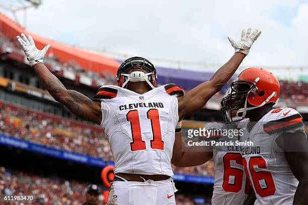 Wide receiver Terrelle Pryor of the Cleveland Browns celebrates with teammate tight end Randall Telfer after scoring a second quarter touchdown...