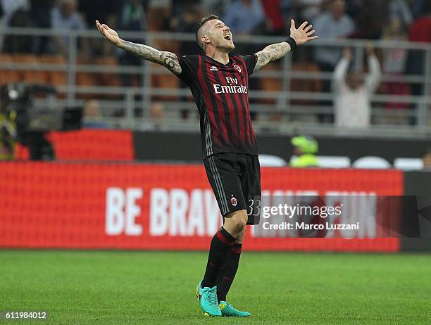 Juraj Kucka of AC Milan celebrates a victory at the end of the Serie A match between AC Milan and US Sassuolo at Stadio Giuseppe Meazza on October 2,...