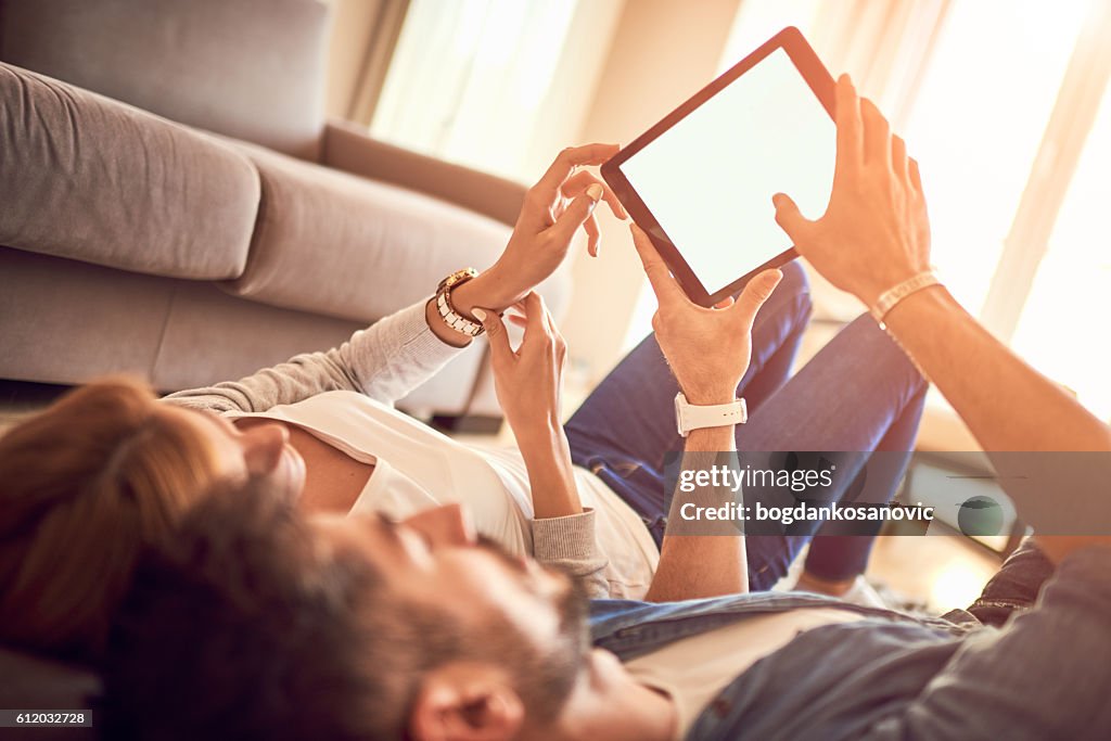 Couple with digital tablet