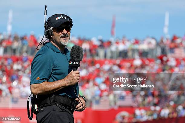 David Feherty of the Golf Channel looks on from the first tee during singles matches of the 2016 Ryder Cup at Hazeltine National Golf Club on October...