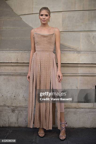 Lena Perminova poses wearing Valentino after the Valentino show at the Hotel Salomon de Rothschild during Paris Fashion Week Womenswear SS17 on...