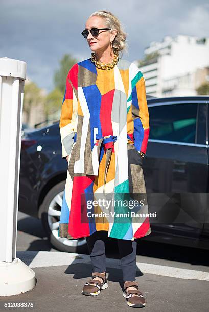 Guest poses wearing Marni after the Celine show at the Tennis Club de Paris during Paris Fashion Week Womenswear SS17 on October 2, 2016 in Paris,...