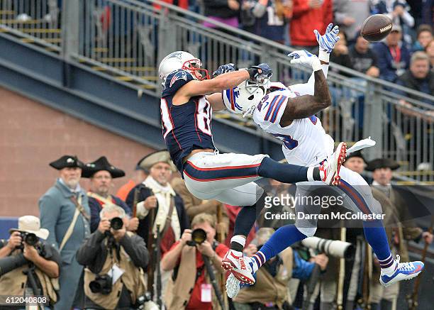 Danny Amendola of the New England Patriots attempts to make the catch in the third quarter against Aaron Williams of the Buffalo Bills at Gillette...