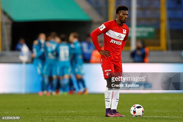 Ze Luis of FC Spartak Moscow reacts as FC Zenit St. Petersburg celebrate a goal in the background during the Russian Football League match between FC...