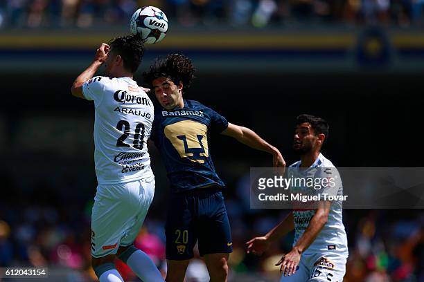 Matias Britos of Pumas fights for the ball with Felix Araujo of Jaguares during the 12th round match between Pumas UNAM and Chiapas as part of the...