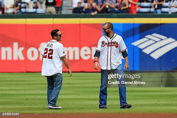 Former Atlanta Braves players Marcus Giles and Adam LaRoche are introduced as members of the All Turner Field Team prior to the game at Turner Field...