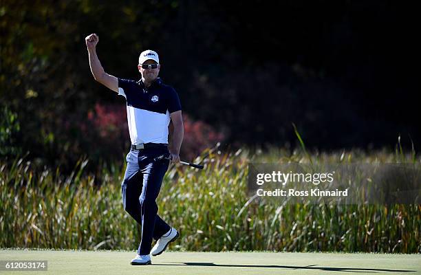 Zach Johnson of the United States reacts to a putt on the tenth green during singles matches of the 2016 Ryder Cup at Hazeltine National Golf Club on...