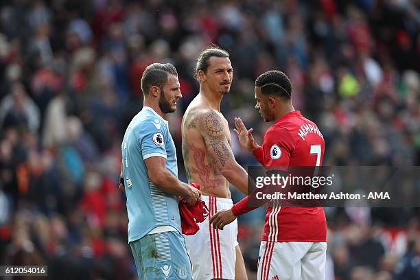 Zlatan Ibrahimovic of Manchester United with his shirt removed showing off his tattoos during the Premier League match between Manchester United and...