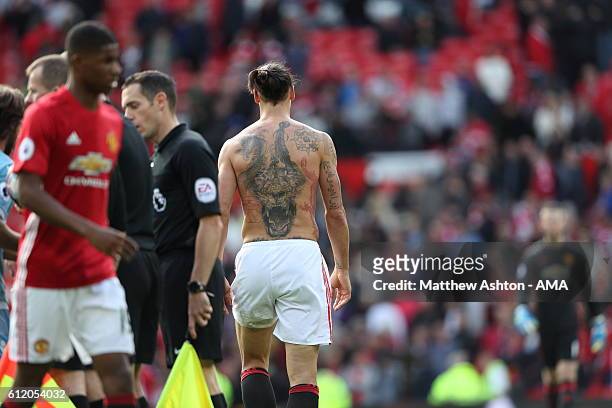 Zlatan Ibrahimovic of Manchester United with his shirt removed showing off his tattoos during the Premier League match between Manchester United and...
