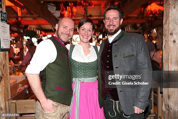 Team dirndl designer 'Amsel Fashion', Alexandra von Frankenberg her brother Philippos Melachrinos and her husband Philipp von Frankenberg during the...