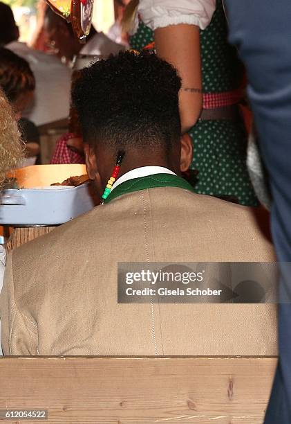 Kingsley Coman hairs during the 'FC Bayern Wies'n' during the Oktoberfest at Kaeferschaenke / Theresienwiese on October 2, 2016 in Munich, Germany.