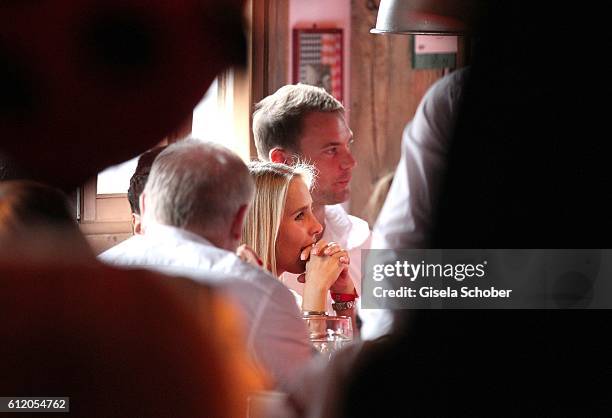 Bayern goal keeper Manuel Neuer and his girlfriend Nina Weiss attend the 'FC Bayern Wies'n' during the Oktoberfest at Kaeferschaenke / Theresienwiese...