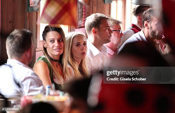 Bayern goal keeper Manuel Neuer and his girlfriend Nina Weiss attend the 'FC Bayern Wies'n' during the Oktoberfest at Kaeferschaenke / Theresienwiese...