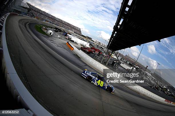 Jimmie Johnson, driver of the Lowe's Chevrolet, races during the NASCAR Sprint Cup Series Citizen Solider 400 at Dover International Speedway on...