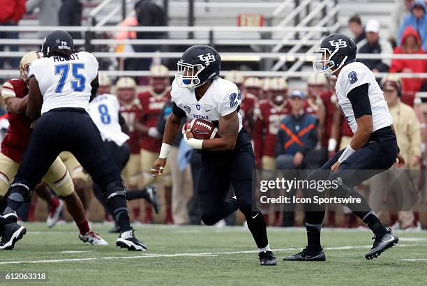 Buffalo Bulls running back Johnathan Hawkins takes the handoff from Buffalo Bulls quarterback Tyree Jackson . The Boston College Eagles and the State...