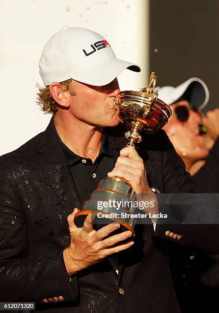 Brandt Snedeker of the United States kisses the Ryder Cup during the closing ceremony of the 2016 Ryder Cup at Hazeltine National Golf Club on...