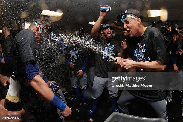 Aaron Sanchez of the Toronto Blue Jays, righ, celebrates the Toronto Blue Jays' 2-1 win over the Boston Red Sox, clinching a Wildcard spot in the...