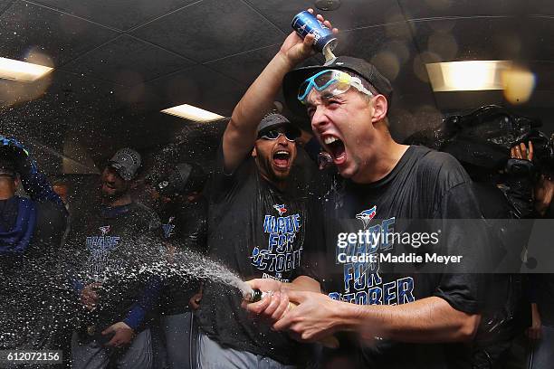 Aaron Sanchez of the Toronto Blue Jays, righ, celebrates the Toronto Blue Jays' 2-1 win over the Boston Red Sox, clinching a Wildcard spot in the...