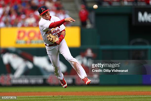 Aledmys Diaz of the St. Louis Cardinals throws a runner out against the Pittsburgh Pirates in the eighth inning at Busch Stadium on October 2, 2016...
