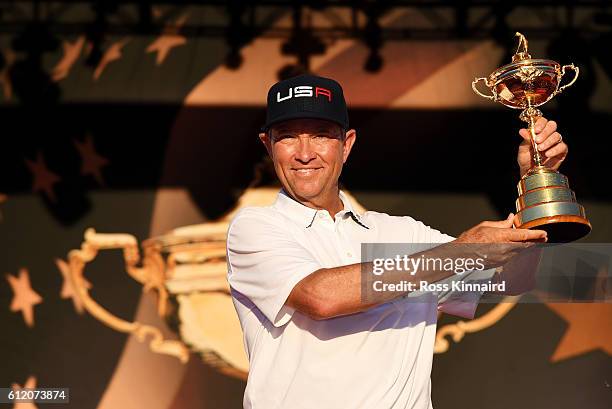 Captain Davis Love III of the United States holds the Ryder Cup during the closing ceremony of the 2016 Ryder Cup at Hazeltine National Golf Club on...