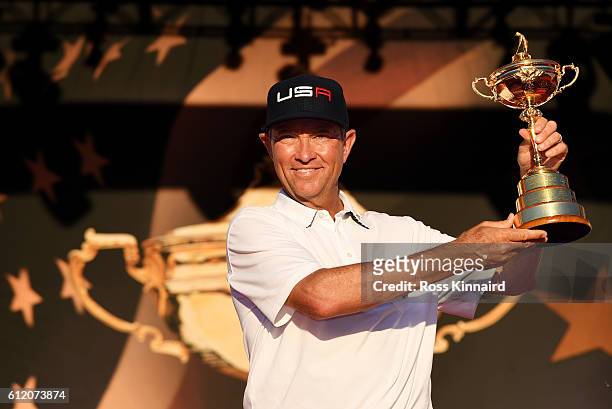Captain Davis Love III of the United States holds the Ryder Cup during the closing ceremony of the 2016 Ryder Cup at Hazeltine National Golf Club on...