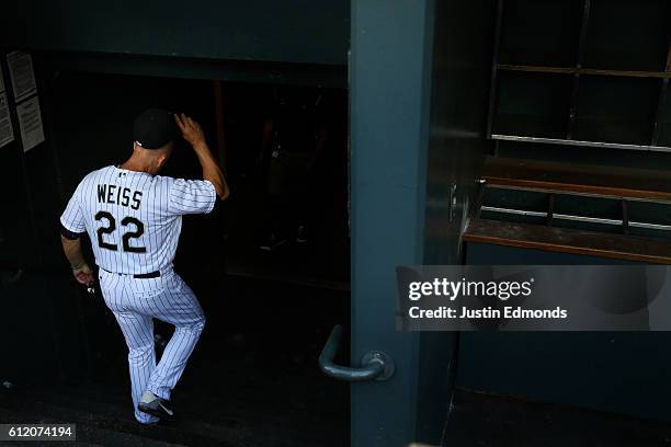 Manager Walt Weiss of the Colorado Rockies walks off the field and into the clubhouse after the final game of the season at Coors Field on October 2,...