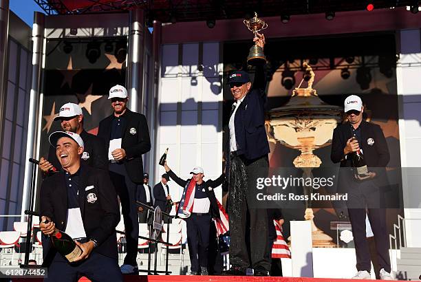 Rickie Fowler, Ryan Moore , Jimmy Walker, captain Davis Love III and Zach Johnson of the United States celebrate during the closing ceremony of the...