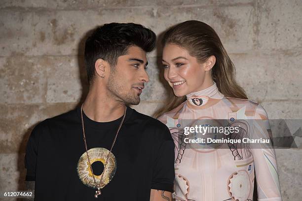 Zayn Malik and Gigi Hadid attend the Givenchy show as part of the Paris Fashion Week Womenswear Spring/Summer 2017 on October 2, 2016 in Paris,...