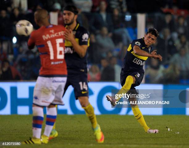 Boca Juniors' defender Jonathan Silva shoots a free kick during an Argentina First Division football match against Tigre, at Jose Dellagiovanna...