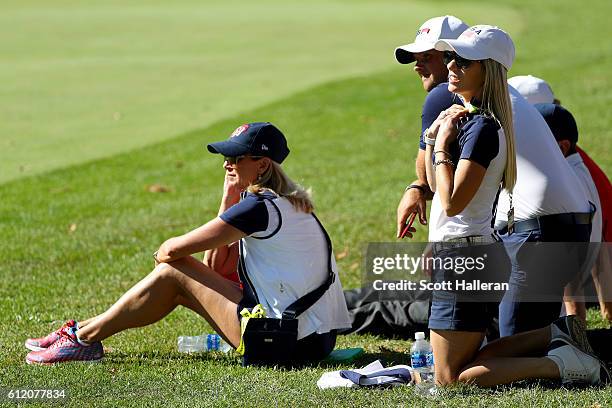 Robin Love, Justine Reed and Patrick Reed of the United States look on during singles matches of the 2016 Ryder Cup at Hazeltine National Golf Club...