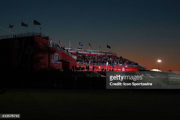 Chaska, MN, USA; Fans wait in the grandstands on the first tee as the sun comes up before the Day 2 morning matches for the 2016 Ryder Cup at...