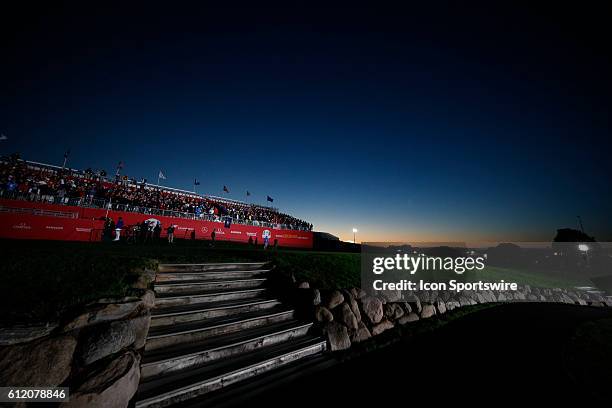 Chaska, MN, USA; Fans wait in the grandstands on the first tee as the sun comes up before the Day 2 morning matches for the 2016 Ryder Cup at...